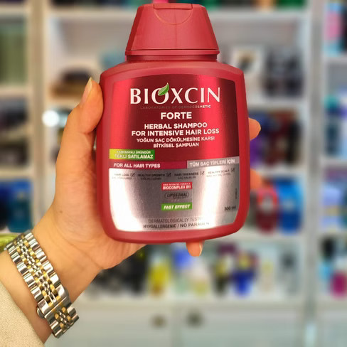 شامپو bioکسین زرشکی مدل فورت ، ضدریزش قوی ، مناسب انواع موها ، با حجم 300 میلی(واردات قانونی از منطقه آزاد ارس)