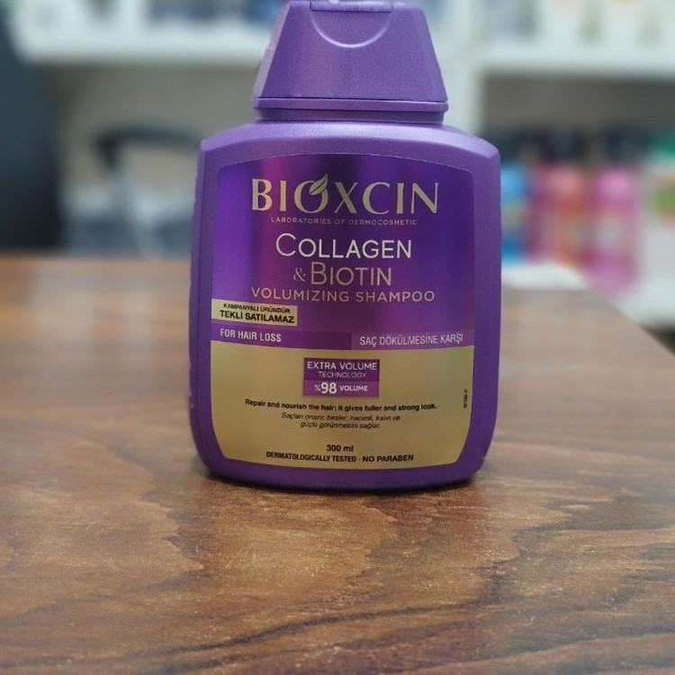 شامپو bioکسین بنفش مدل کلاژن و بیوتین ، ضد ریزش و حجم دهنده ، مناسب برای انواع موها بهویژه موهای کمپشت ، نازک و مستعد ریزش ، با حجم 300 میلی(واردات قانونی از منطقه آزاد ارس)